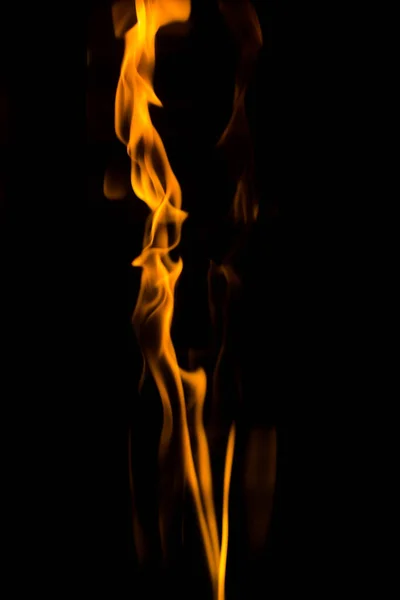 Dancing flame on the black background — Stock Photo, Image