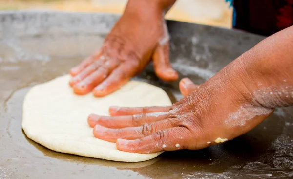 A woman preparing a cake