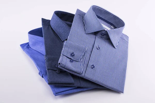 Camisas masculinas clássicas empilhadas — Fotografia de Stock