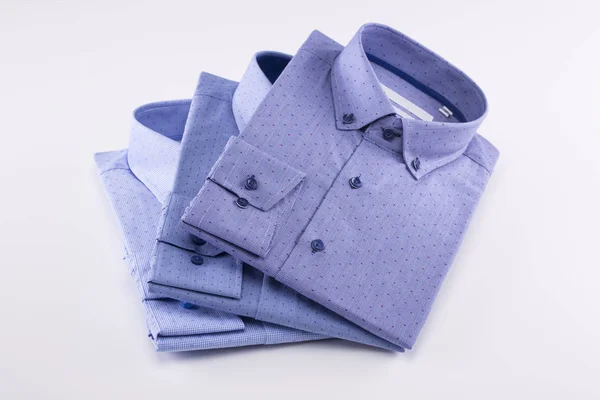 Camisas masculinas clássicas empilhadas — Fotografia de Stock