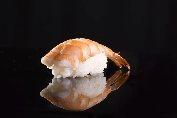 Japanese food on a black background — Stock Photo, Image