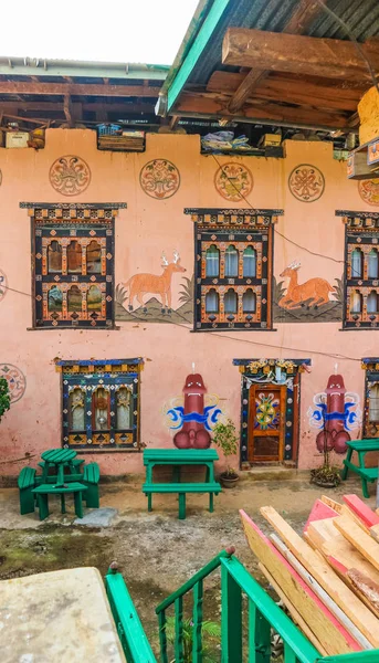 Traditional Bhutanese house with religious phallus wall paintings near Punakha, Bhutan.