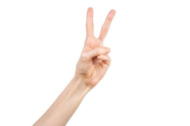 Beyaz arka planda eli olan beyaz kadın eli barış işareti yapıyor. El hareketi. Hareketlendirme kavramı.