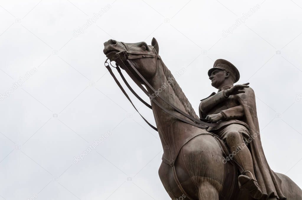 Bronze memorial statue of Mustafa Kemal Ataturk, the founder of the Republic of Turkey,  over the sky.