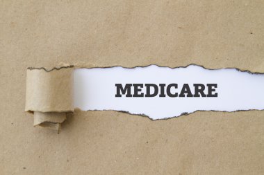 Medicare yazıt karton delik içinde