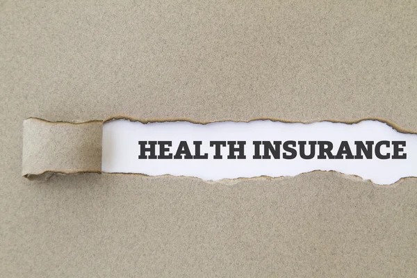 Health Insurance Inscription Hole Cardboard — Stock Photo, Image