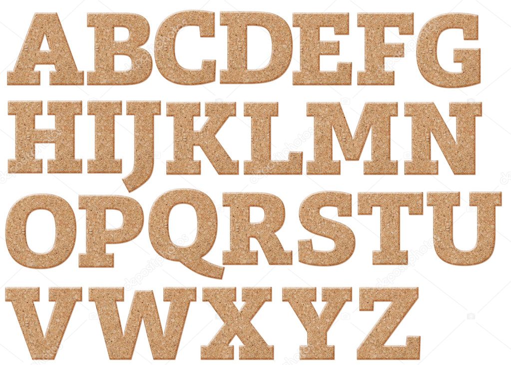 carved cork alphabet letters isolated on white