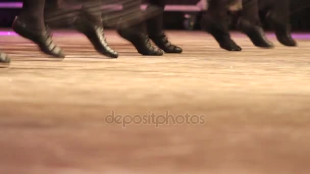 Women dancing Irish dance on stage with traditional step shoes — Stock Video