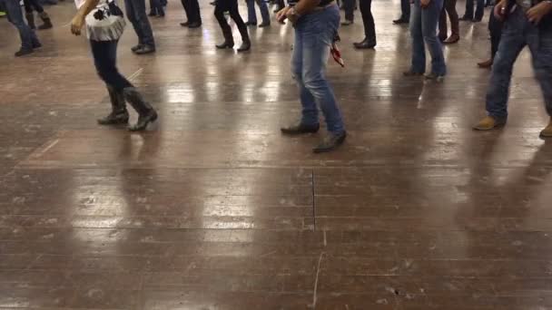 Line dance of cowboy at western festival boots USA flag — Stock Video