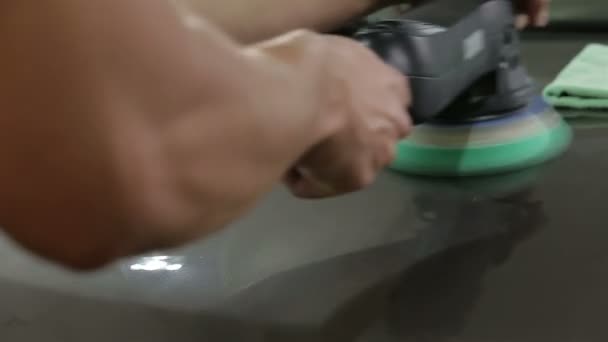 Brown car is polishing — стоковое видео