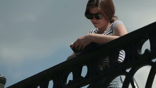 Beautiful Happy Girl On a Bridge In Summer — Stock Video