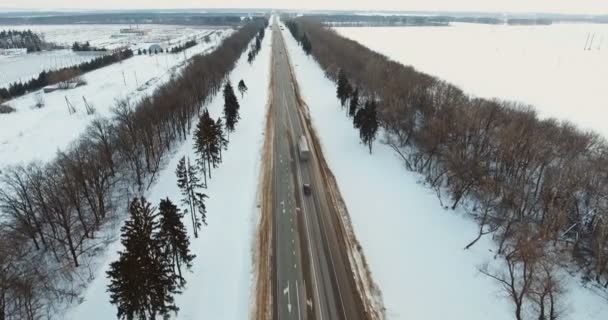 Car on winter road. Winter landscape. — Stock Video