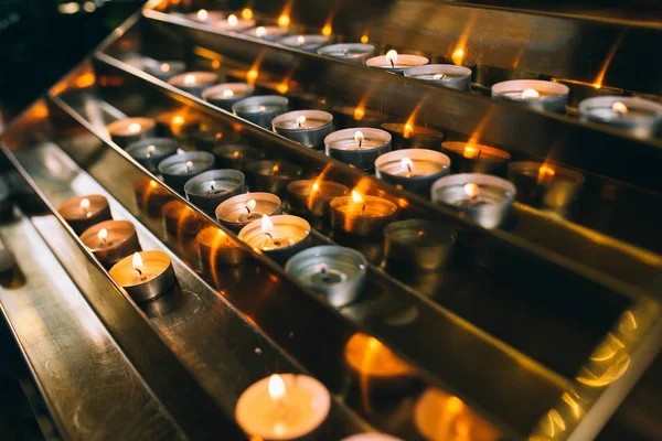Burning candles on church altar — Stock Photo, Image