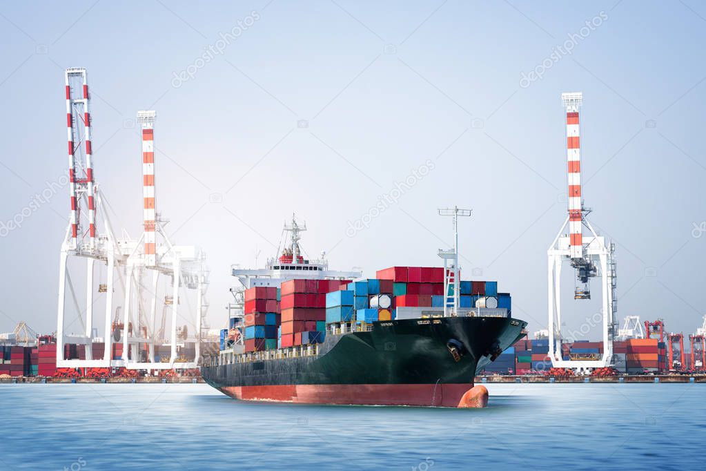 Logistics import export background of Container Cargo ship in seaport on blue sky