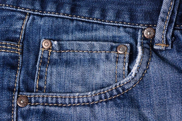 Jeans aus nächster Nähe. Verschlüsse, Tasche, Nähte. Die Verflechtung des Gewebes — Stockfoto