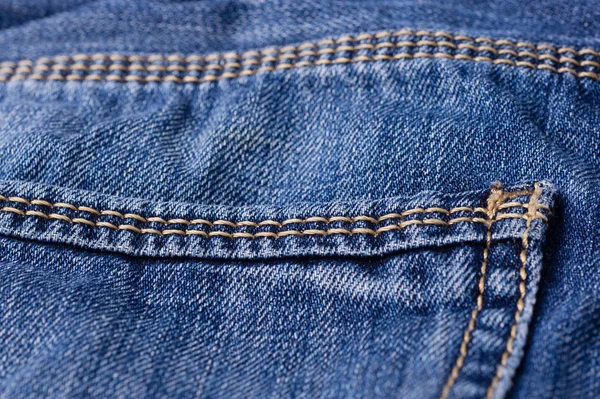 Jeans aus nächster Nähe. Tasche, Nähte. Verflechtung des Gewebes mit einem Klon — Stockfoto