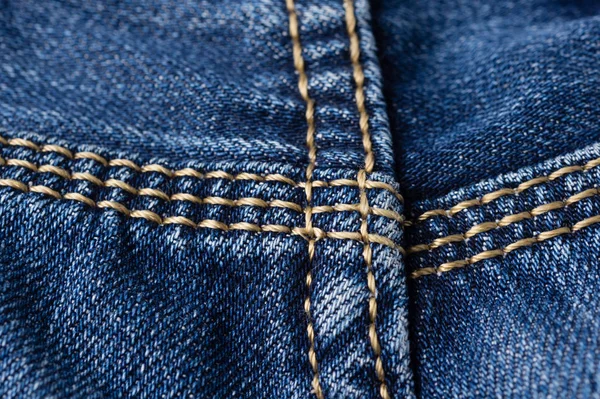 Jeans aus nächster Nähe. Nähte. Verflechtung des Gewebes mit einer Nahaufnahme — Stockfoto