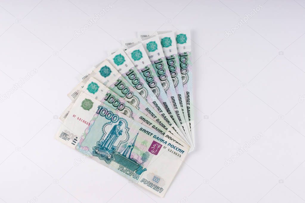 A stack of thousand-ruble banknotes, spread out money. Russian c