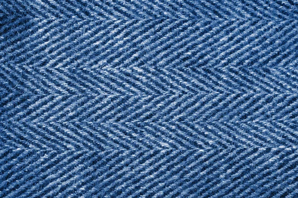 Interlacing the fabric with a close-up.  toned  in classic blue