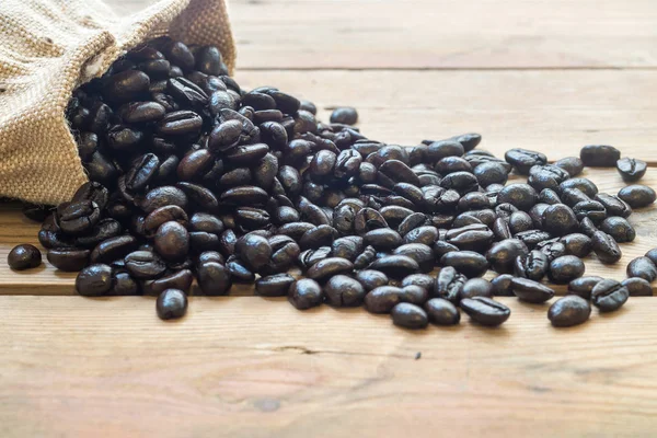 Coffee beans out of the sack. — Stock Photo, Image