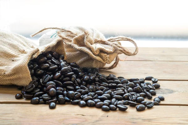 Coffee beans out of the sack. — Stock Photo, Image