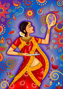 Hintli kadın elekten Karwa Chauth kutlamaları sırasında arıyor