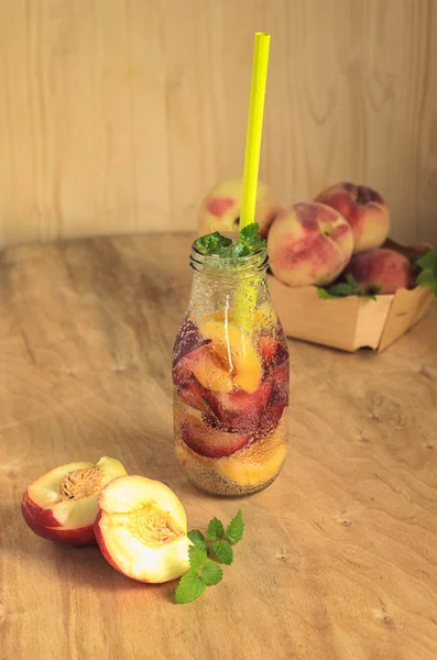Fruit drink made of peaches and mint