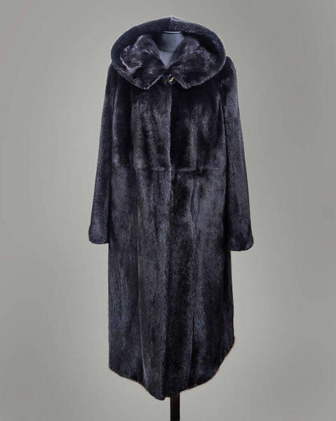 Free cut black mink coat with undercut yoke on the chest line on the rack
