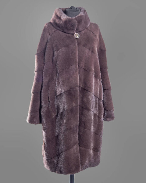 Mink coat in lilac-brown tones, cut oblique stripes straight silhouette. Horizontal frame