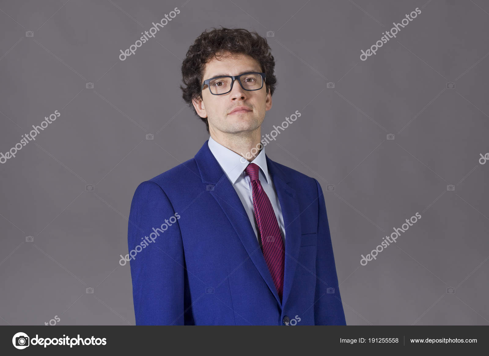 Nice Man Glasses Curly Hair Wearing Blue Suit Stock Photo