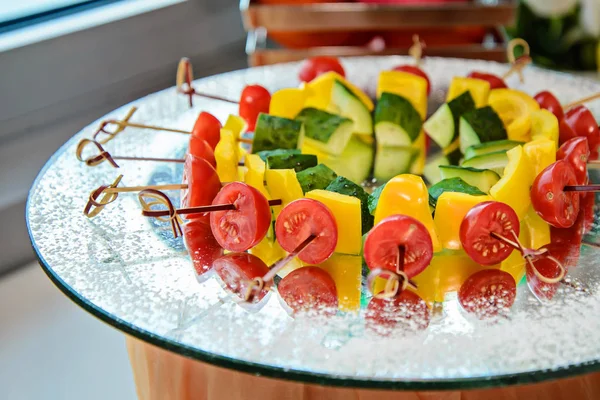 Colorful vegetables on the skewers in the dish — Stock Photo, Image