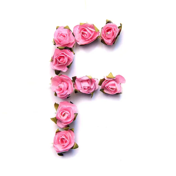 Буква F английского языка - розовый цвет на белом фоне — стоковое фото