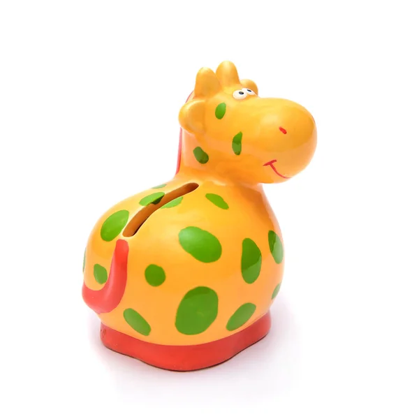 Porseleinen beeldje piggy Bank gele koe of een giraffe — Stockfoto