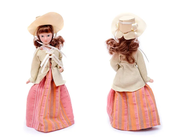 Porcelain doll in vintage outfit and hat, front and rear view — Stock Photo, Image