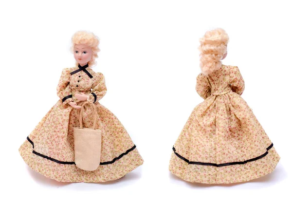 Porseleinen pop in een lange vintage beige jurk met een zak-, voor- en achteraanzicht — Stockfoto
