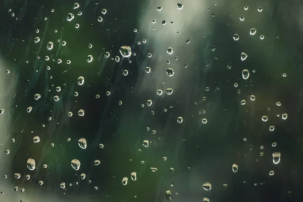 Gotas de lluvia en el vidrio empañado — Foto de Stock