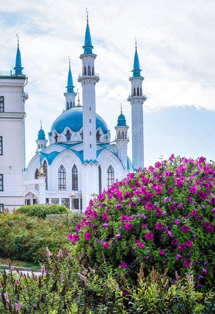 Kazan, Russia, August 24, 2019: view of the Kul Sharif mosque with beautiful flowers in the foreground