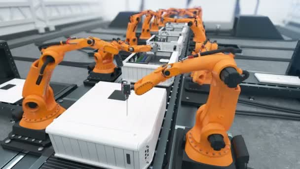 Robotic Arms Assembling Computers On Conveyor Belt Close-up. Advanced Automated Process. Looped 3d Animation. Business and Technology Concept. 4k UHD 3840x2160. — Stock Video