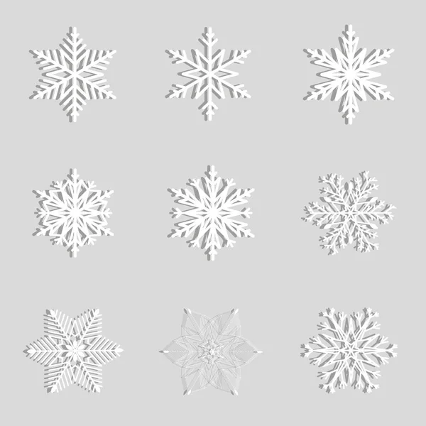 Conjunto de copos de nieve blancos con diseño de sombra — Vector de stock