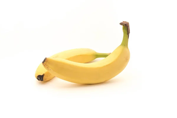 Banana amarela isolada sobre fundo branco — Fotografia de Stock