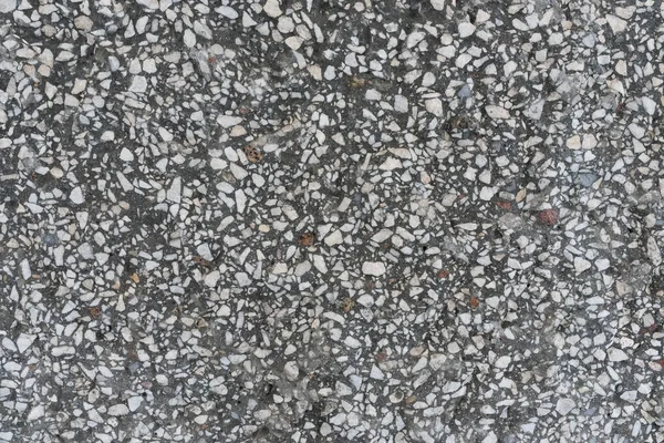 La pared gris de virutas de granito, fondo, textura — Foto de Stock