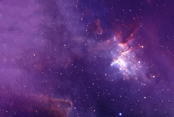 深宇宙、宇宙の輝きを持つ星雲。この画像の要素はNASAによって提供されました。. — ストック写真