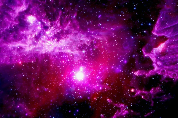 A distant pink galaxy. With stars and nebulae. Background. Elements of this image were furnished by NASA.