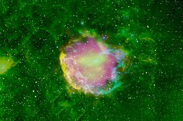Green nebula with a bright cloud and stars. Elements of this image were furnished by NASA — 스톡 사진