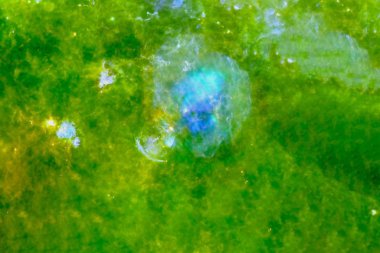 Yumuşak yıldızlı yeşil nebula. Bu görüntünün elementleri Nasa tarafından döşendi