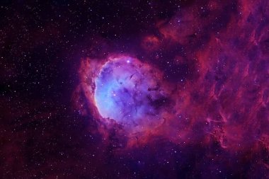 Yıldızlı ve nebulalı güzel mavi bir yer. Bu görüntünün elementleri NASA tarafından döşendi. Herhangi bir amaç için.