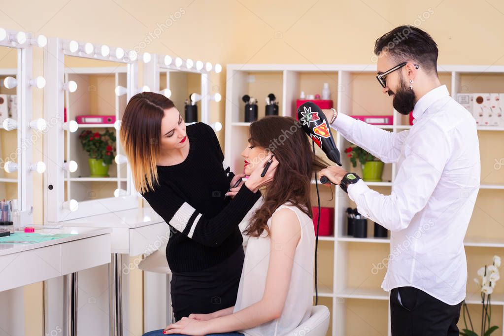 beauty salon, makeup and styling in the salon, hairdressers and make-up artist,