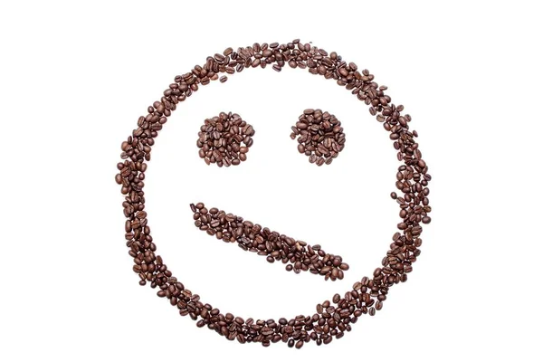 Sorriso confuso irritado de grãos de café isolados em fundo branco — Fotografia de Stock