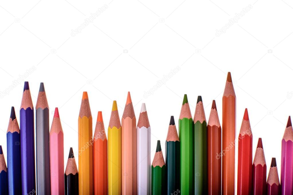 Many colored pencils isolated on white background, place for text