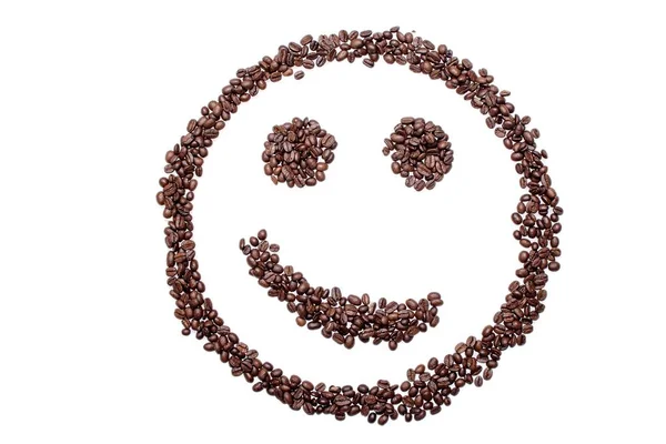Skadliga leende smiley kaffebönor isolerad på en vit bakgrund Stockbild